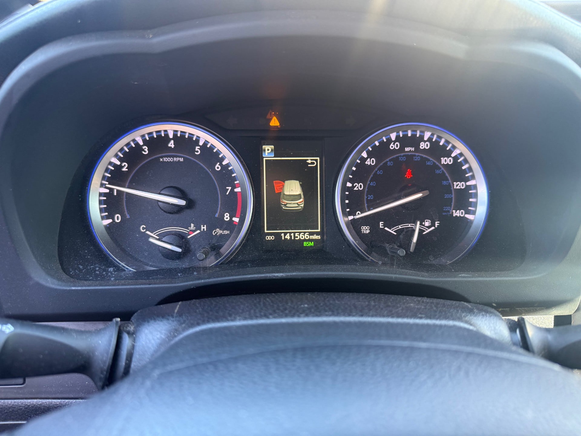 Thumbnail of Speedometer showing 141,566 miles1